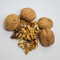Heap of walnuts on white. cracked walnut isolated on the white background. Royalty Free Stock Photo