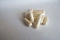 Heap of white capsules of Acetyl L-Carnitine