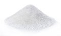 Heap of white sugar isolated on white background.