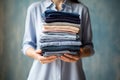 Laundry woman stack cloth textile housework clean fashion cotton pile shirt background
