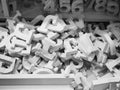 Heap of wooden alphabets and numbers,