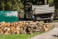 Heap of wooden logs in a city park in Goryachy Klyuch, Russia. Copy space for text.