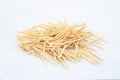 A heap of wooden toothpicks on white isolated background Royalty Free Stock Photo