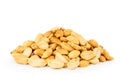 Heapof roasted peanuts close up on a white. Isolated. Royalty Free Stock Photo