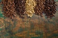 Heaps of assorted raw and roasted coffee beans Royalty Free Stock Photo