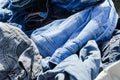 Heaps of clothing on the second hand market Royalty Free Stock Photo