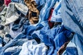 Heaps of clothing on the second hand market Royalty Free Stock Photo