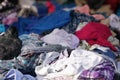 Heaps of clothing on second hand market Royalty Free Stock Photo