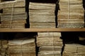 Heaps and stacks of old papers and documents, storage of archives, long-term storage of notarial documents