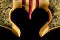 Cut out heart on a Maple, Purple Heart and Buckeye Burl Exotic Wood Bass Guitar Royalty Free Stock Photo