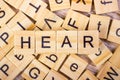 hear - cube with letters, sign with wooden cubes