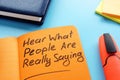 Hear what people are really saying sign. Active listening technique concept Royalty Free Stock Photo