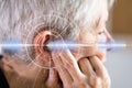 Hearing Aid And Painful Ear Ache Royalty Free Stock Photo