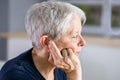 Hearing Aid And Painful Ear Ache Royalty Free Stock Photo