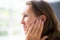 Hearing Aid And Painful Ear Ache Royalty Free Stock Photo