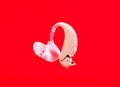 Hearing aid on red