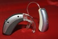 Hearing aids and assistive devices