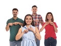 Hearing impaired people showing word FRIEND on sign language isolated