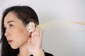 Hearing test showing ear of young woman with sound waves Royalty Free Stock Photo