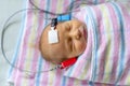 Hearing test of a sleeping newborn at hospital