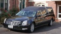 Hearse arriving or leaving a funeral due to the Increasing death from Corona virus and Covid 19 pandemic outbreak