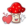 With heart amanita mushroom mascot cartoon