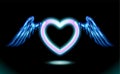 Heart anime neon with wings, blue glow radiant effect of love with space for Valentines day. Decorative holiday design, night Royalty Free Stock Photo