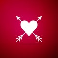 Heart with arrow icon isolated on red background. Happy Valentine`s day. Cupid dart pierced to the heart. Love symbol Royalty Free Stock Photo