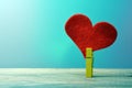 Heart attached to clothespin Royalty Free Stock Photo