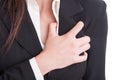 Heart attack or cardiac arrest gesture made by suited woman