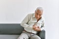 Heart attack disease problem in old man, Elderly asian man with hand on chest gesture. Royalty Free Stock Photo