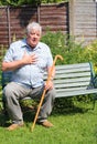 Heart attack or difficulty breathing, elderly man. Royalty Free Stock Photo
