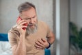 A midaged bearded man having a heart attack Royalty Free Stock Photo