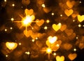 Heart background boke photo, dark yellow color. Abstract holiday, celebration and valentine backdrop. Royalty Free Stock Photo
