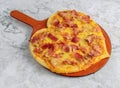 Heart Bacon valentine pizza with melting cheese tomatoes ham for Valentine\'s day with ingredients top view fast food