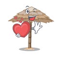 With heart beach shelter under the umbrella cartoon