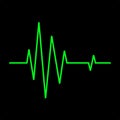 Heart beat ekg line, EKG Monitor. Green line shows the heart beat. on black background Royalty Free Stock Photo
