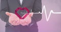 Heart beat over businessman hands holding heart Royalty Free Stock Photo