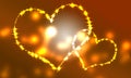 Heart big and small pair brown background of light Royalty Free Stock Photo