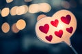 Heart bokeh background, night city lights. Heart shape bokeh from street light. City in love. Valentine\'s Day Royalty Free Stock Photo