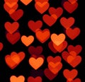 Heart bokeh background, photo blurry objects, brown red on black Royalty Free Stock Photo