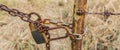 The old chain is rusty and the lock looks like a heart shape Royalty Free Stock Photo