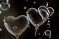 heart bubbles captured midpop, with droplets suspended in air