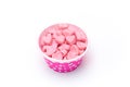 Heart candy in Pink polka dot paper cups isolated Royalty Free Stock Photo