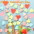 Heart with candy Valentine Background with red rose and happy valentine text in blue background Royalty Free Stock Photo