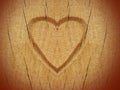 Heart carved on wood Royalty Free Stock Photo