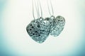 Heart on chain. Three blue hearts. Valentine`s Day holiday. Blue hearts for boys and men