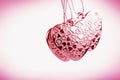 Heart on chain. Three pink hearts. Valentine`s Day holiday. Pink hearts for lovers girls and women