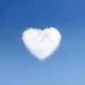 Heart of clouds symbol of love on background of blue sky Royalty Free Stock Photo