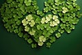 Heart of clover leaves on green background. St.Patrick\'s Day, Happy st patricks day decoration concept made from